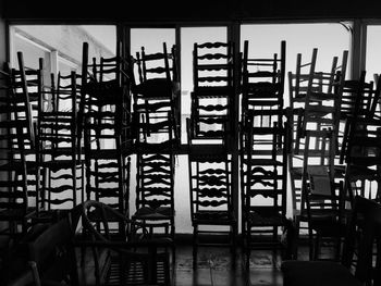 Stack of chairs in building