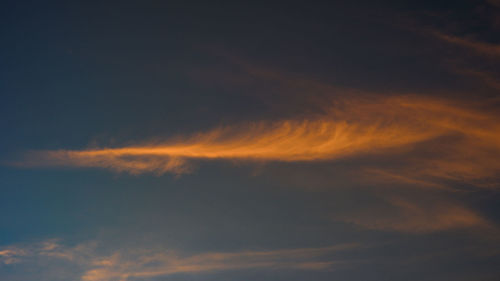 Low angle view of clouds in sky during sunset