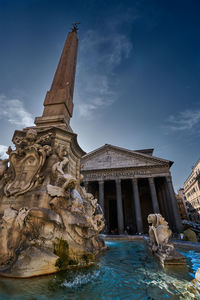 Statue of building against sky