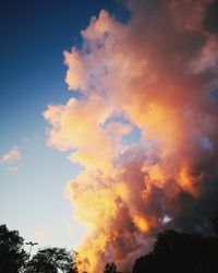 Low angle view of dramatic sky during sunset