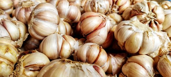 Full frame shot of onions for sale at market