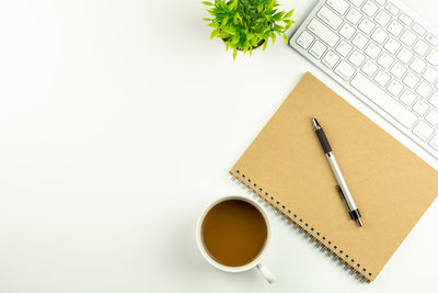 High angle view of coffee cup on table