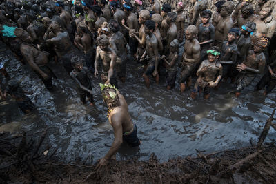 High angle view of people in river