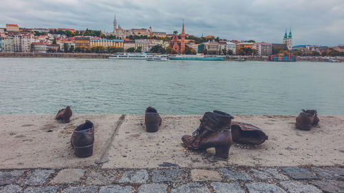 Panoramic view of river and buildings against sky