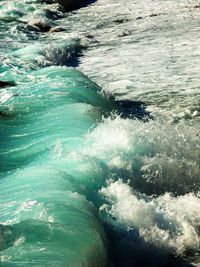 Waves splashing on rocks