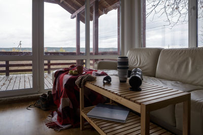 Camera lens on table at home