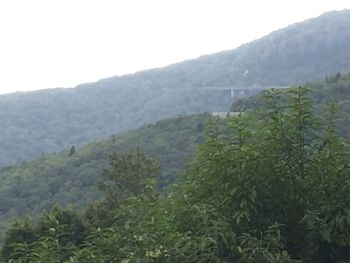 Scenic view of landscape against sky during rainy season
