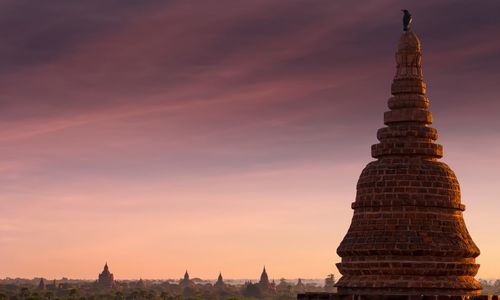 Low angle view of temple against sky during sunset