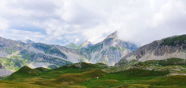Panoramic view of mountains against sky
