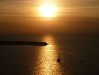 Scenic view of sea at sunset