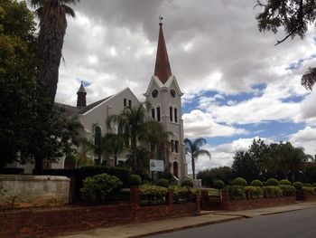 Built structure against cloudy sky
