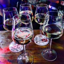 Close-up of wine glasses on table