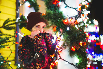 Woman with christmas tree