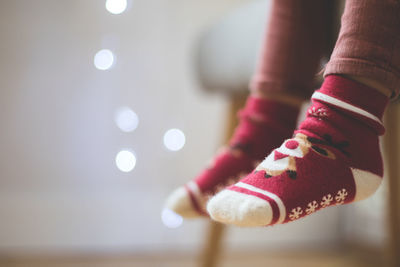 Low section of woman standing on floor