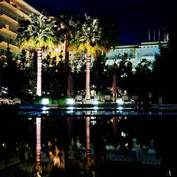 Reflection of illuminated buildings in water