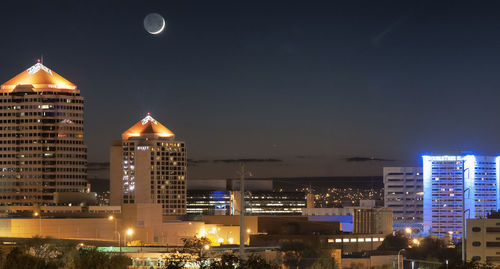 Illuminated cityscape at night