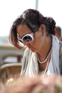 Close-up of woman wearing sunglasses 