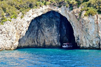 Small boat in a sea cave