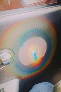 High angle view of rainbow in car