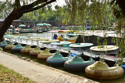 Boats moored at harbor