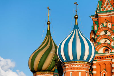 Low angle view of historic building against clear blue sky