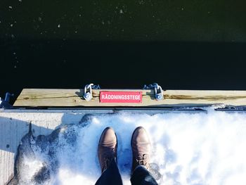 Low section of person standing on ground