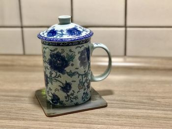 Close-up of tea cup on table