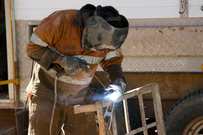 Man welding at workshop