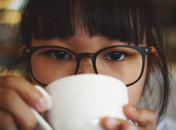 Portrait of man drinking coffee