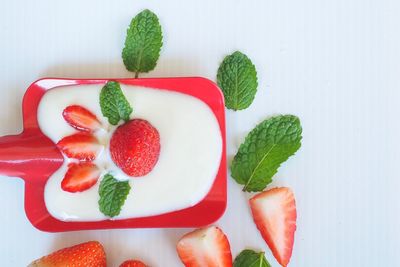 Directly above shot of fruits in plate on table