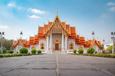 View of temple building against sky