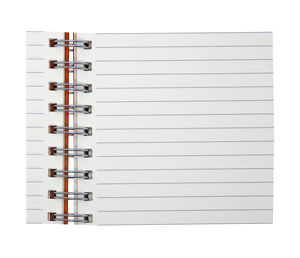 Close-up of spiral notebook against white background