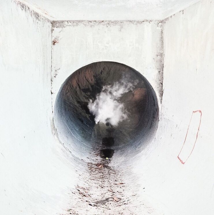 water, built structure, reflection, close-up, circle, day, indoors, abandoned, no people, wet, wall - building feature, architecture, metal, one animal, high angle view, old, dirty, building exterior, wall