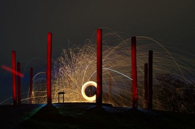 Light trails against sky at night