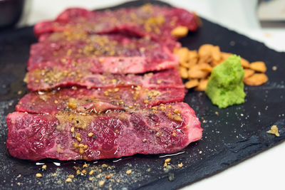 Close-up of meat on barbecue grill