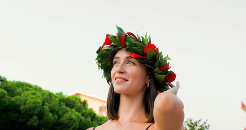Girl with laurel wreath on her head symbol of graduation in the italian university