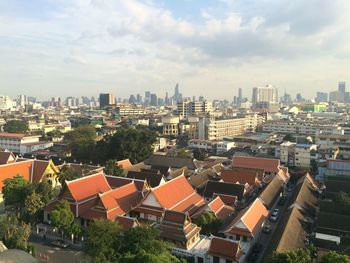 High angle view of buildings in city against sky