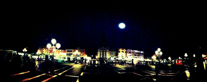 Illuminated street light at night