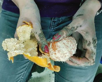 Close-up of man preparing food