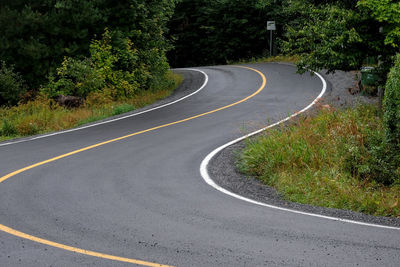 A shot of winding road in a mountainous area of central quebec.