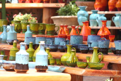 Close-up of ceramics for sale at market stall