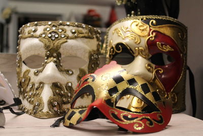 Close-up of masks on table for sale