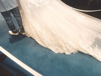 Low section of woman standing on floor