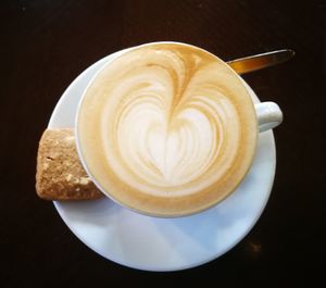 High angle view of cappuccino on table