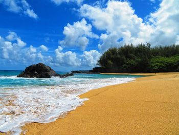 Scenic view of beach against sky