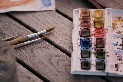 High angle view of paintbrushes on table