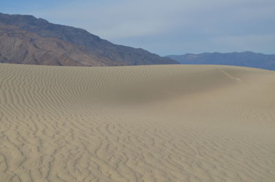Scenic view of desert against sky