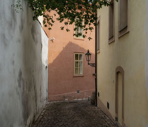 Alley amidst buildings in city