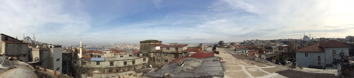 Town against cloudy sky