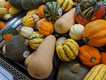 High angle view of pumpkins for sale at market stall